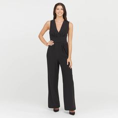 This versatile bodysuit is the ultimate solution for low-back dresses! The flawless-finish fabric is lightweight, cling-free, and offers 360 degrees of comfortable, single-layer shaping for a sleek, all-over feel. And, best of all? The innovative design features lightly padded, fit-flexible wireless cups and adjustable, convertible straps for a variety of styling options Elegant Sleeveless Bodysuit With Built-in Bra, Chic Fitted Bodysuit With Back Opening, Elegant V-neck Elastane Jumpsuits And Rompers, Versatile Fitted V-neck Jumpsuit, Versatile Fitted V-neck Jumpsuits And Rompers, Chic V-neck Elastane Jumpsuits And Rompers, Elegant Spring Jumpsuits And Rompers With Back Opening, Elegant Fitted Bodysuit With Back Opening, Fitted Jumpsuits With Back Opening