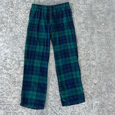 Plaid Fleece Pajama Pants Never Worn Green Sleepwear With Pockets For Pajama Party, Green Sleep Bottoms With Elastic Waistband, Green Sleepwear Long Pants For Sleepover, Cozy Relaxed Fit Pants For Sleepover, Green Relaxed Fit Sleep Pants, Cozy Blue Loungewear Pants, Casual Relaxed Fit Pants For Bedtime, Cozy Casual Relaxed Fit Pants, Casual Relaxed Fit Bedtime Pants