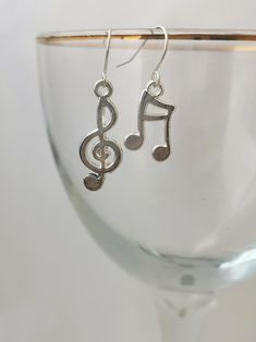 Asymetric treble clef and music note earrings. hypoallergenic, nickel free, silver plated. Boho, statement earrings, light to wear. Handmade. Odd earrings. Mismatched earrings. Music lover gift Silver Music-themed Jewelry For Party, Music-themed Silver Jewelry For Parties, Odd Earrings, Music Notes Earrings, Music-themed Silver Metal Jewelry, Silver Music-themed Metal Jewelry, Music-themed Silver Earrings, Music-themed Dangle Jewelry Gift, Music Note Jewelry