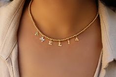 "name necklace A personalized gift for your loved one is why we create this trendy name necklace. 14k gold filled letters can spell out a name or word and hang on a stretchy elastic 3mm 14k gold filled or sterling silver beads chain. Letters measure approximately 1/4 of an inch in length. Also available sterling silver. CUSTOM LETTER NECKLACE This necklace can be customized with any letter of your choice. ✤ Please use the personalization box to let us know the initial that you would like. * DETA Everyday Personalized Letter Jewelry, Elegant Name Necklace With Letter Beads For Anniversary, Elegant Letter Beads Name Necklace For Personalized Gift, Custom Name Letter Jewelry For Everyday, Customizable Letter Jewelry For Everyday, Customized Letter Jewelry For Everyday, Everyday Custom Name Letter Jewelry, Everyday Customized Letter Jewelry, Elegant Letter Beads Name Necklace Gift