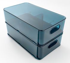 two plastic storage containers sitting side by side on top of each other, one blue and the other clear