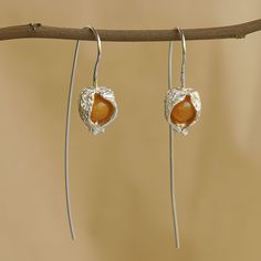 "The perfect gift for nature lovers♥ Made from topaz and great for everyday wear, these golden berry earrings are your best shot at looking chic and classy on a budget. There is no need to reach for the gaudy and everyday accessory you go for. Change your looks and entire appearance by just reaching for this pair of simple yet elegant earrings. Whether it is a meeting with the boss or a casual night out with the girls or a fun evening out all by yourself, these pair have got you covered. It is i Bohemian Birthstone Earrings As Gift, Ground Cherry, Golden Berry, Berry Earrings, Cape Gooseberry, Orchid Earrings, Flower Earrings Gold, Gold Orchid, Antique Silver Jewelry