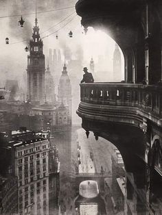 an old black and white photo of a cityscape with lots of tall buildings