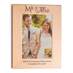 PRICES MAY VARY. 100% Alder Wood Made in USA and Imported Personalized wood frame: Click "customize now" to add two Personalized bottom lines to frame Designed & laser engraved in the USA: Custom picture frame is designed and engraved in Merrillville, IN. Engraves dark brown. Size & material: Holds a 5 inch x 7 inch photo and has a glass insert; measures 7.5 inches x 9.5 inches overall; made of genuine alder wood - wood grain may vary; easel and wall mount hooks attached to back of frame Great p Desktop Keyboard, Wedding Gift For Couple, Wedding Frame, Wall Mounted Hooks, Personalized Wedding Gift, Mr And Mrs Wedding, Portrait Wedding, Wedding Picture Frames, Custom Picture Frame