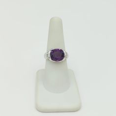 Beautiful 3.61 ct. amethyst oval and 0.41 ct. good quality white diamond rounds.  Handmade in platinum.  Ring size 7.  Metal:Platinum Stone: Amethyst,White Diamond Stone Cut: Oval Cut  Dimensions reference the ring size and are not specific to the ring itself. Exact ring dimensions are not provided. Please reach in the seller Q&A for questions. Diamond Cocktail Ring, Diamond Cocktail Rings, Platinum Ring, Stone Cuts, Ring Size 7, Diamond Stone, Cocktail Ring, Cocktail Rings, Oval Cut