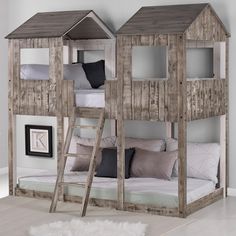 a wooden bunk bed with two sets of windows on each side and a ladder to the top