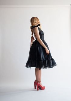 Black Fitted Organza Evening Dress, Formal Knee-length Organza Dress, Black Organza Summer Dresses, Formal Fitted Organza Midi Dress, Black Organza Evening Dress With Ruffles, Fitted Organza Midi Dress For Formal Occasions, Fitted Knee-length Organza Dress, Chic Black Organza Dress, Black Tea-length Dress With Fitted Bodice