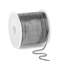 a spool of metallic wire on a white background with a cord attached to the spool