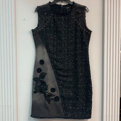 Black Sleeveless Tweed Dress. Denim With Floral Embroidery. Closure: Zips Halfway Down The Back. Fringed Edges. In Mint Condition. Dress Denim, Black Tweed, Tweed Dress, Size 8 Dress, Black Sleeveless, Floral Embroidery, Denim Dress, Mint Condition, Colorful Dresses