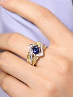 *Condition: Brand new *Center Stone: Natural Blue Sapphire, Emerald cut, approx 1.45ct *Side stones: Natural White Diamond, round cut (VS1 clarity and F color) Natural Yellow Diamond, round cut (VS1 clarity) *Metal Purity: Optional *Ring Weight: 8.87g (depend the ring size) *This page price only for ring, for the pendant detail please message us Each piece is made-to-order with care and special attention to detail. all items are made with conflict-free diamonds and gems. Size: made to order The Luxury Trillion-cut Sapphire Ring, Luxury Blue Marquise Rings, Luxury Blue Marquise Jewelry, Luxury Trillion Cut Sapphire Ring For Formal Occasions, Luxury Trillion Cut Sapphire Ring For Formal Events, Luxury Trillion Cut Sapphire Ring With Diamond, Blue Sapphire Ring With Diamond And Polished Finish, Luxury Blue Trillion Cut Sapphire Ring, Luxury Blue Trillion-cut Sapphire Ring