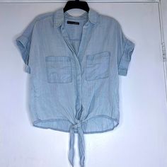 Brand: Black Tape Style: Nwot Relaxed Fit Denim Button Down, Tie Front Shirt Size: Xs Color: Light Denim Wash Material: 100% Tencel Any Questions, Feel Free To Ask! New Items Are Added Every Week. Will Ship Same Or Next Day. :) Add To Bundle For A Discount. Comes From A Smoke Free/Pet Free Home. Please Note All Sales Final. Black Tape Delivers An Updated Classic Style With This Petite Button-Front Shirt Featuring Self Ties At The Hem. * Relaxed Fit; Approx. 18-1/2" Long * Designed To Fit And Fla Washed Blue Chambray Button-up Top, Medium Wash Chambray Button-up Blouse, Light Wash Short Sleeve Denim Top With Buttons, Light Wash Denim Top With Short Sleeves And Buttons, Light Wash Denim Top With Short Sleeves, Casual Medium Wash Blouse With Button Closure, Casual Chambray Button-up Blouse, Casual Blouse With Button Closure In Medium Wash, Light Wash Chambray Button-up Top