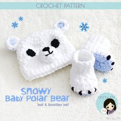 a crocheted baby polar bear hat and booties set with snowflakes