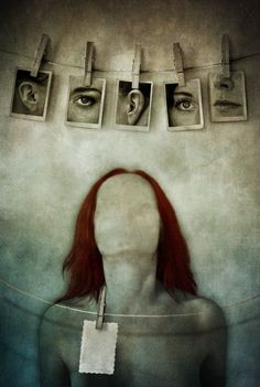 a woman's head with four photos hanging above it