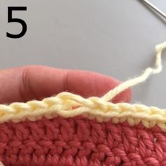 someone is crocheting the stitchs together to make a pattern for an ornament