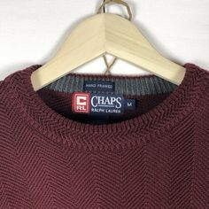 Stay warm and stylish with this classic Chaps Ralph Lauren men’s pullover knit sweater. Crafted in a rich brown color, this medium-sized sweater is perfect for layering during colder months or wearing on its own for a casual yet polished look. With a durable knit pattern, this sweater is both comfortable and long-lasting. • Brand: Chaps by Ralph Lauren • Size: Medium • Color: Brown • Material: Soft and durable knit fabric • Condition: Very Good Used Condition with minimal signs of wear • Fit: Cl Brown Crew Neck Polo Sweater For Winter, Ralph Lauren Casual Fall Sweater, Ralph Lauren Knit Tops For Fall, Ralph Lauren Crew Neck Sweater For Fall, Ralph Lauren Cable Knit Sweater For Fall, Ralph Lauren Sweater With Ribbed Cuffs For Fall, Classic Brown Sweatshirt For Fall, Classic Brown Sweater For Layering, Brown Classic Sweatshirt For Fall