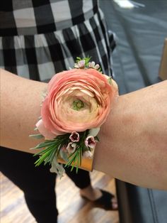 a close up of a person's arm with a flower on it