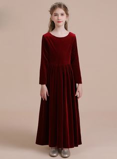 This is a single color velvet long sleeve and a long dress. It is a line and has an ankle-length hemline. The fabric used throughout the dress is velvet and the color is burgundy. At the back, it has a zipper up. And they are cleaned throughout this dress at the lower part. The Burgundy velvet color Gives it a Shine and it stands out. It also has narrow leaves which gives you a slimmer appearance. This gown is inspired by medieval Fashion. Flower Girl Dresses Long Sleeve, Casual Flower Girl, Simple Flower Girl, Long Sleeve Flower Girl Dress, Simple Flower Girl Dresses, Ceremonial Clothing, Long Flower Girl Dresses, Velvet Flower, Civil Wedding Dresses