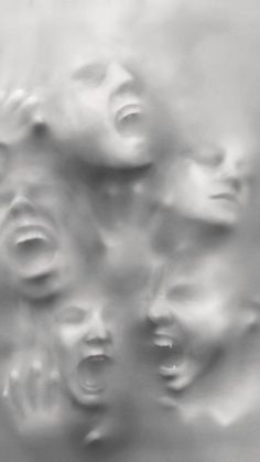 many faces are seen through the raindrops in this black and white photo,