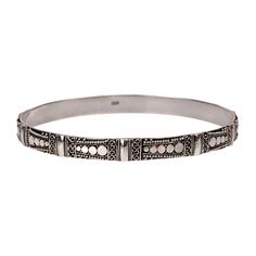 A BANGLE WITH AN INTRICATE SILVER AND FILIGREE DESIGN Line Dot, Filigree Design, The Line, Ring Bracelet, Chains Necklace, Ring Earrings, Bangles, Dots, Pendant Necklace