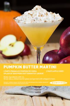 the pumpkin butter martini is garnished with whipped cream and apples on the side