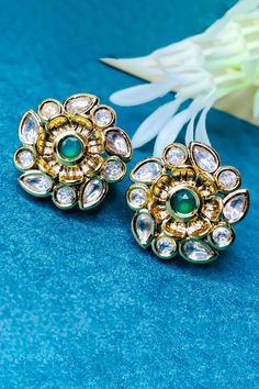 These are a beautiful pair of studs with Gold Plating and the finest quality of Kundan. These studs are in a gold-tone and will match a variety of outfits. You can wear then with a sensible workplace formal, traditional outfits, western, into-western, or casual gatherings. Option 1: Red Color (E736) Option 2: Green Color (E737) Option 3: White Color (E738) Best for gifting or for personal use, wear it to any occasion and be the spotlight. Eye-catching and unique jewelry that will set you apart. Elegant Gold Stud Earrings, Kids Handicraft, Saree Petticoat, Silver Pooja Items, Saree Jewellery, Glass Bangles, Silver Toe Rings, Gold Chain With Pendant, Kundan Earrings