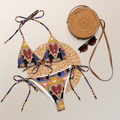 Hi Thank you for being here ⭐️ Original Unique Illustration Eco Friendly Bikini Original Design: This Trippy Heart Bikini is more than just swimwear; it's a wearable piece of art that embodies the essence of self-expression and liberation.  Sizing Style & Fit :  With sizes available up to 6XL, this bikini caters to a wide range of body types, embracing inclusivity and celebrating the beauty of diversity. 🦋 Detailed size chart can be found on the last image of this listing. 🦋 Adjustable: The it Multicolor Adjustable Swimwear For Poolside, Adjustable Multicolor Swimwear For Poolside, Printed Swimwear For Festival During Beach Season, Printed Swimwear For Beach Season Festivals, Fitted Multicolor Swimwear For Music Festival, Beachwear Swimwear With Triangle Top For Music Festival, Triangle Top Swimwear For Music Festival, Adjustable Multicolor Swimwear For Sunbathing, Festival Printed Fitted Swimwear