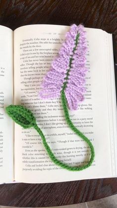 A crochet purple wisteria flower with a green stem and leaf bookmark Wisteria Crochet Pattern, Purple Crochet Projects, Purple Flower Tree, Crochet Wisteria, Marque-pages Au Crochet, Leaf Crochet, Crochet Purple, Bookmark Crochet, Wisteria Tree