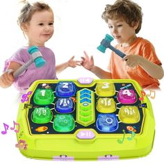 two children playing with an electronic toy