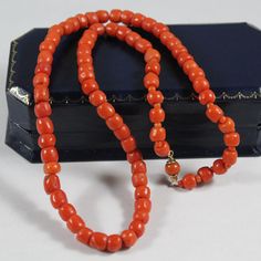 -Antique 9k Gold Natural Orange Red Coral Necklace -Total length: 16 in -Biggest bead size:5.75 mm x 5.65 mm -Smallest bead size: 4.25 mm x 5.4 mm -Total weight: 19.7 g -Not perfectly round Classic Formal Necklace With Oval Beads, Classic Oval Bead Necklace For Formal Occasions, Classic Orange Necklaces For Formal Occasions, Classic Orange Necklace For Formal Occasions, Classic Red Beaded Necklace As Gift, Classic Oval Beads Necklaces For Gifts, Classic Oval Beads Necklace For Gift, Classic Red Beaded Necklace For Gift, Classic Red Beaded Jewelry