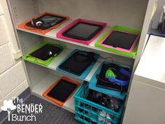 the shelves are filled with different types of electronic devices