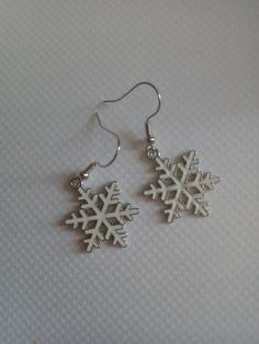 These cute white snowflakes are perfect for any winter occasion not just Christmas. Snow Flake Earrings, Snowflake Jewelry, Winter Earrings, Snowflake Earrings, Silver Snowflakes, White Snowflake, Christmas Wishlist, Etsy Earrings Dangle, Favorite Jewelry