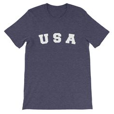 Happy 4th of July everyone These USA shirts are sure to put you in the spirit of independence. The patriotic shirts are UNISEX shirts. Enjoy these nice 4th of July shirts. This is a UNISEX shirt. This t-shirt is everything you've dreamed of and more. It feels soft and lightweight, with the right amount of stretch. It's comfortable and flattering for both men and women. * 100% combed and ring-spun cotton (heather colors contain polyester) * Fabric weight: 4.2 oz (142 g/m2) * Shoulder-to-shoulder 4th Of July Cotton T-shirt With Text Print, Independence Day Crew Neck Tops Made In Usa, Casual 4th Of July T-shirt Made In Usa, 4th Of July Streetwear T-shirt With Letter Print, Casual T-shirt Made In Usa For 4th Of July, Blue Short Sleeve T-shirt For Independence Day, Patriotic Pre-shrunk Shirt For 4th Of July, Casual Crew Neck Shirt Made In Usa, 4th Of July Cotton Graphic Tee Shirt