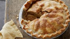 a pie sitting on top of a wooden table