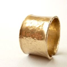 A statement, modern, urban ring. Light and comfortable this wide flat band gold ring will enhance any outfit for any occasion. Handmade of 14k gold filled.The ring measure 13mm wide,0.5mm thick. Fits size 61/2-7. Ring left-open therefore you can adjust it a bit. $56 Hammered Wide Band Ring As Gift, Hammered Wide Band Open Ring As Gift, Gift Wide Band Ring With Hammered Open Design, Wide Gold Band, Thick Gold Band, Gold Jewellry, Handmade Silver Jewellery, Custom Wedding Rings, Hammered Band