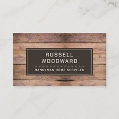 a business card with the name russell woodward on it, in brown and white