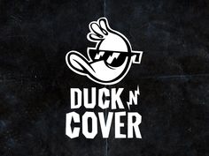 the duck n cover logo is shown on a black background with white letters and an image of a bird wearing sunglasses