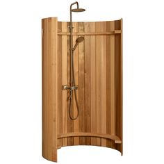 a wooden shower stall with the door open