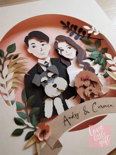 an image of a couple and their dog on a paper cutout with leaves around it