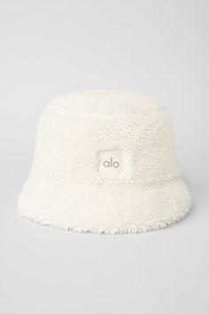 Foxy Sherpa Bucket Hat - Camel | Alo Yoga Sherpa Outfit, Bucket Hat Girl, Sherpa Bucket Hat, White Bucket Hat, Gym Bag Essentials, Fur Bucket Hat, Cold Weather Hats, Yoga Gear, Tank Top Bras