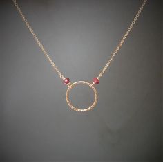 This dainty handmade necklace features 2 natural Ruby gemstones wrapped on a hoop with 14k Gold Filled or Sterling Silver. This delicate hoop necklace can be made in the length of your choice whether you would like it as a choker or a regular necklace. Simple, delicate, and dainty, perfect to wear every day or for any occasion. You can wear it alone or layered with other necklaces. Makes a great gift to add to any gemstone lover's collection. Perfect to gift for Christmas, Valentine's Day, Mothe Delicate Layered Necklace, Simple Gold Necklace, Hoop Necklace, Gold Necklace Simple, Handmade Jewelry Necklace, Ruby Necklace, Necklace Simple, Ruby Jewelry, July Birthstone