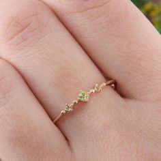 Unique peridot promise ring for her, Small & Dainty rose gold womens peridot ring, Simple 3 stone promise ring, Delicate promise ring WE OFFER UNLIMITED PERIOD INSTALLMENTS PLAN This is a beautiful, stunning, feminine ring that works well for all occasions, styles, and ages. You will love it! Ring information: Stones: Peridot Approximate size: 2.5mm (1 stone) Approximate size: 1.5mm (2 stones) Approximate width of Band 1.3mm Metal type: Gold Metal stamp: 14k Gold Installment Payments We offe Dainty Rings Engagement, Cute Promise Rings, Promise Rings Simple, Promise Rings Vintage, Unique Promise Rings, Dainty Rose, Dainty Engagement Rings, Dainty Rings, Promise Ring For Her