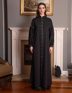 Elevate your wardrobe with this stunning black abaya, designed for the modern woman who appreciates both style and modesty. This elegant abaya features intricate embellishments along the front and cuffs, adding a touch of sophistication and luxury. The flowing silhouette and premium fabric ensure a comfortable fit, making it perfect for special occasions, formal events, or everyday wear. Pair it with your favorite accessories to create a truly unforgettable look. This abaya is more than just a g Black Abaya, Crepe Fabric, Sleeve Detail, Dress Clothes For Women, Modest Fashion, Modern Woman, Formal Event, Fashion Statement, Classic Black