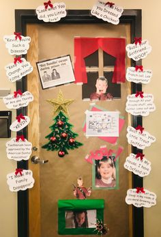 a door decorated with christmas decorations and pictures