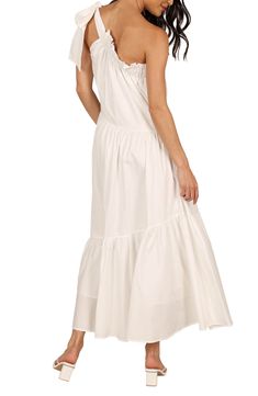 An oversized bow punctuates the shoulder of this all-cotton maxi dress with a ruffled neckline and side-seam pockets. Slips on over head One-shoulder neck Side-seam pockets Lined 100% cotton Hand wash, dry flat Imported White Ruffle Hem Maxi Dress For Daywear, Ruffled Midi Dress For Daywear, White Maxi Dress With Ruffle Hem For Daywear, Cotton Maxi Dress With Ruffles For Daywear, Sundress With Ruffled Straps For Daywear, Sundress Maxi Dress With Ruffled Straps For Daywear, Sundress Style Maxi Dress With Ruffled Straps For Daywear, One-shoulder Cotton Midi Dress, Chic Cotton Maxi Dress With Ruffle Hem