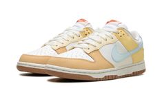 The Women’s Nike Dunk Low Next Nature "Soft Yellow" is a women’s-exclusive colorway of the eco-friendly sneaker with yellow details.  On the “Soft Yellow” Dunk Low Next Nature, the shoe has a Summit White leather base and Soft Yellow and Alabaster-colored leather overlays.  An Aquarius Blue leather Swoosh branding appears on the sides.  The hue also appears on the leather heel tab with classic “Nike” embroidery.  Underfoot, the outsole is constructed of recycled Nike Grind material.  Release dat Yellow Dunks, Nike Dunk Low Next Nature, Aquarius Blue, Nike Embroidery, Yellow Nikes, Pretty Shoes Sneakers, Black Converse, Yellow Shoes, Stadium Goods