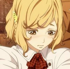 an anime character with blonde hair wearing a white shirt and red bow tie looking at the camera