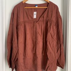 Nwt Old Navy Burnt Orange Peasant Blouse. Never Worn Professional Or Casual Top. Orange Relaxed Fit Long Sleeve Blouse, Orange Long Sleeve Blouse With Relaxed Fit, Fall Peasant V-neck Top, Casual Tunic Peasant Top For Fall, Peasant Style Brown Long Sleeve Tops, Brown Long Sleeve Peasant Top For Summer, Summer Brown Long Sleeve Peasant Top, Orange Fall Tops For Daywear, Orange Tops For Fall Daywear