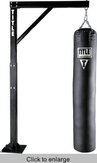 a black punching bag hanging from a metal stand