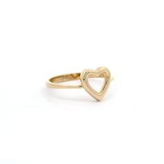 Experience the simplicity and elegance of our heart outline ring. Crafted from 14k yellow gold, this delicate ring features a timeless heart outline design that will add a touch of love and sophistication to any outfit. A must-have for any jewelry collection! Metal: 14k GoldType: RingSize: 6.5 Minimalist Heart Ring With Open Heart Charm, Minimalist Open Heart Ring With Heart Charm, Minimalist Open Heart Promise Ring, Minimalist 14k Gold Heart Cut Stackable Rings, 14k Gold Heart Cut Stackable Rings In Minimalist Style, Classic 14k Gold Heart Ring For Everyday, Yellow Gold Open Heart Ring With Heart Charm, Everyday Yellow Gold Heart Charm Ring, Everyday Yellow Gold Heart Ring With Charm