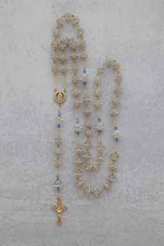 Something Blue Wedding Rosary | 14K Gold Filled with Crystal Beads | Catholic Wedding Gift Add a touch of elegance and tradition to your special day with this stunning Something Blue Wedding Rosary. Crafted with 14K gold-filled details and sparkling crystal beads, this rosary makes a beautiful and meaningful gift for the bride. A perfect keepsake for a Catholic wedding, it features an intricately detailed Virgin Mary centerpiece, symbolizing love, faith, and devotion. Whether for prayer or as a Vintage Catholic Jewelry, Blue Catholic Aesthetic, Elegant Beaded Wedding Rosary, Catholic Wedding Aesthetic, Rosary Aesthetic, Diy Rosary, Rosary Pouch, Catholic Wedding Traditions, Wedding Rosary